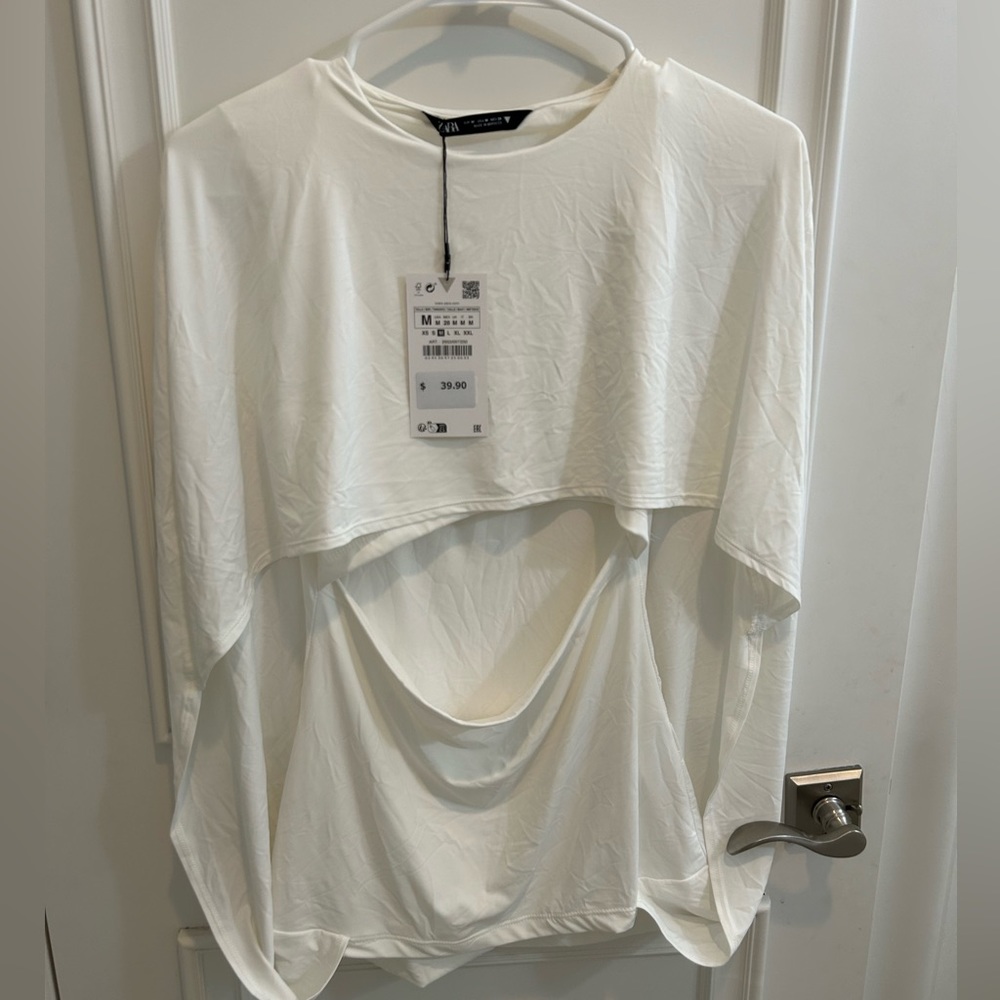 New. Zara white top with slit